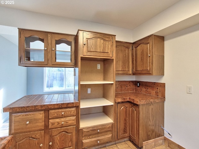 kitchen featuring tile countertops