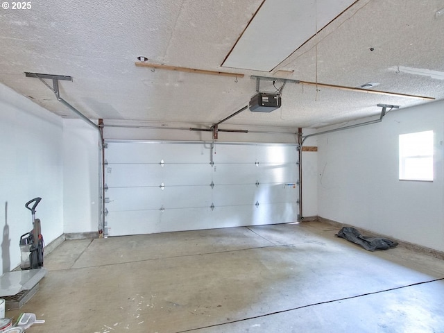 garage featuring a garage door opener