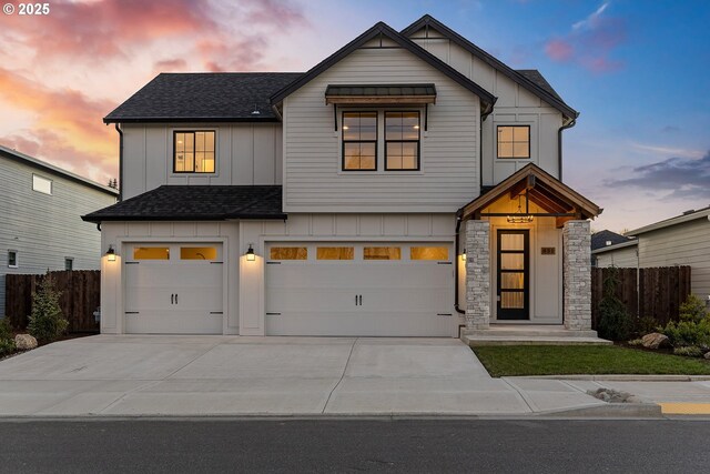 modern farmhouse style home featuring a garage