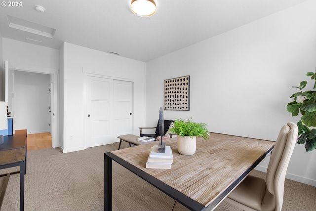 dining space with carpet floors