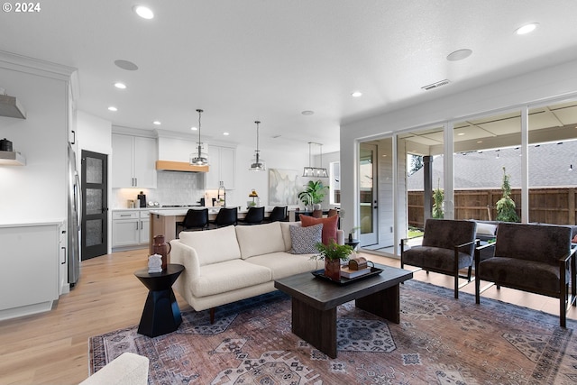 living room featuring light wood-type flooring