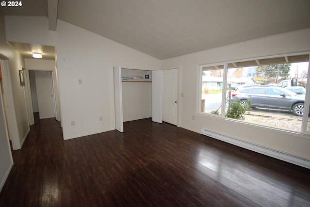 unfurnished bedroom with vaulted ceiling with beams, a closet, dark hardwood / wood-style flooring, and a baseboard radiator