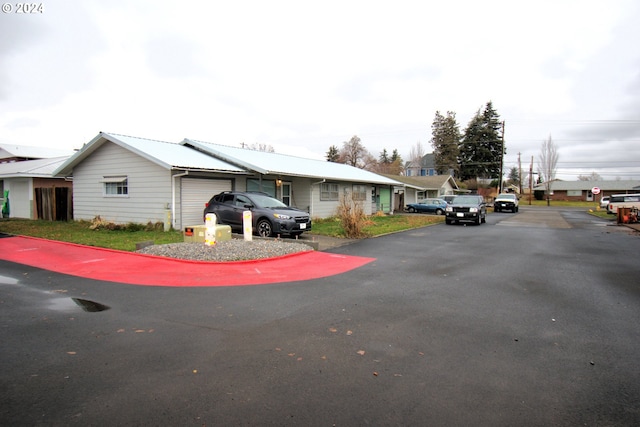 ranch-style house featuring a garage