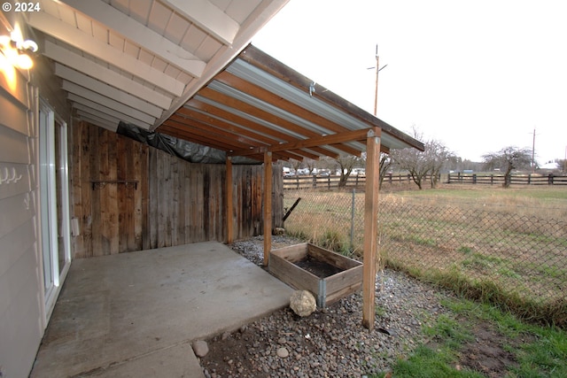 exterior space with a rural view