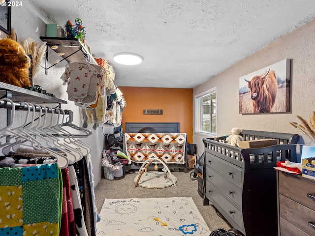 walk in closet featuring carpet flooring