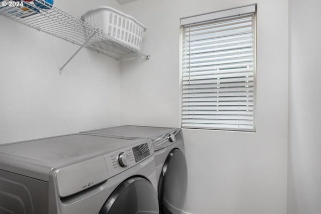 washroom featuring separate washer and dryer