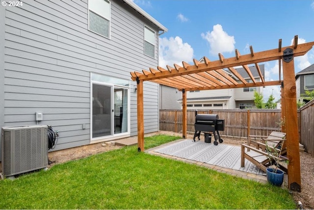 rear view of property featuring a pergola, central AC, and a lawn