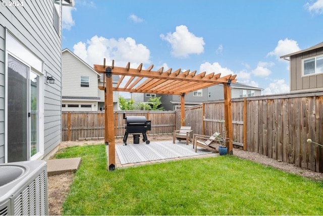 view of yard with cooling unit, a patio area, and a pergola