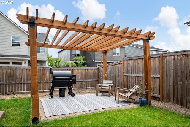 view of patio / terrace with area for grilling and a pergola