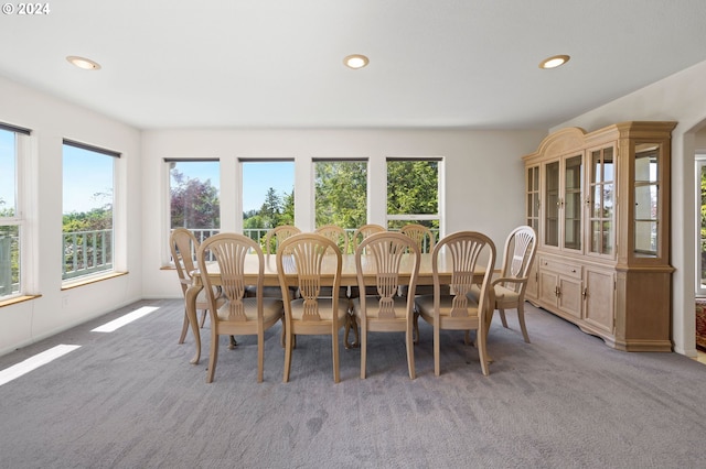 view of carpeted dining area