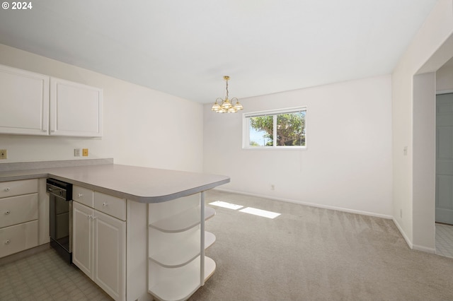 kitchen featuring kitchen peninsula, light carpet, decorative light fixtures, and an inviting chandelier