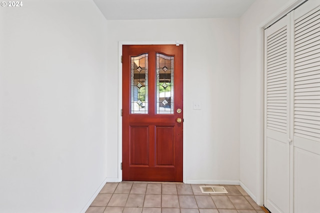 view of tiled entrance foyer