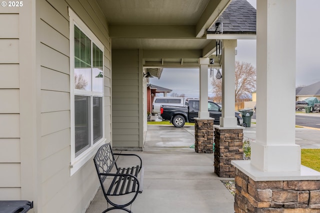 view of patio featuring a porch