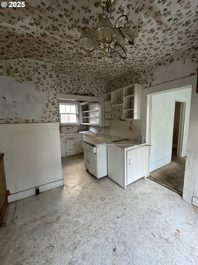 kitchen featuring white cabinetry