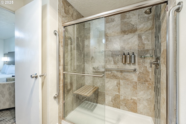 bathroom featuring an enclosed shower