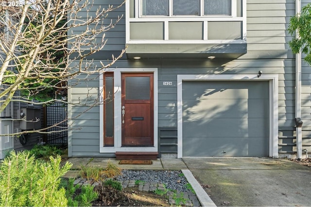 property entrance with a garage