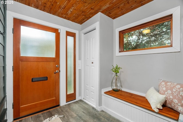 foyer featuring hardwood / wood-style floors and wood ceiling