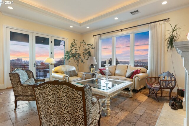 living room featuring built in shelves and ornamental molding