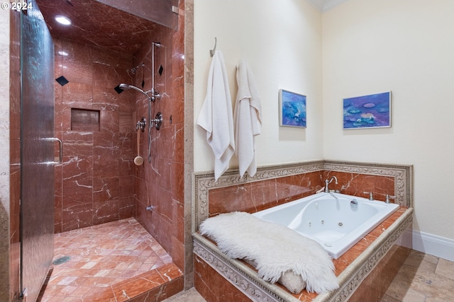 bathroom featuring a whirlpool tub and a stall shower