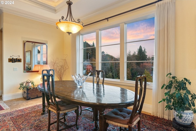 dining area featuring ornamental molding