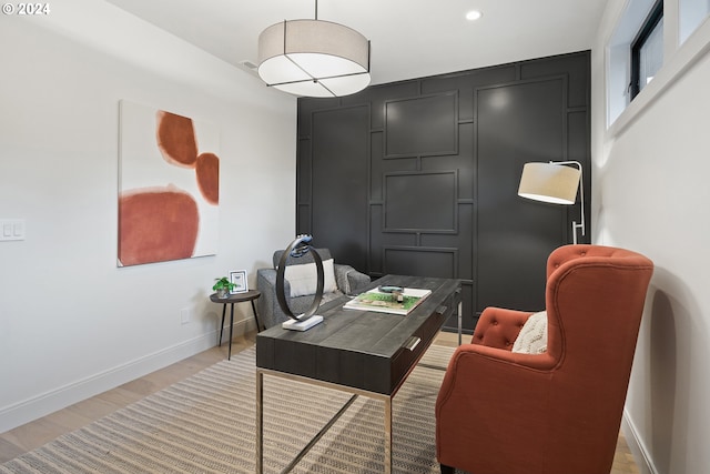 office with light wood-type flooring, baseboards, and recessed lighting