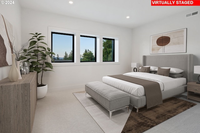 bedroom featuring baseboards, carpet flooring, visible vents, and recessed lighting