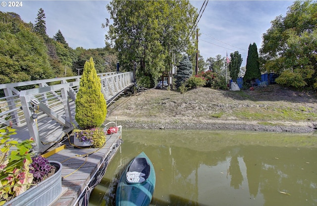 view of dock featuring a water view