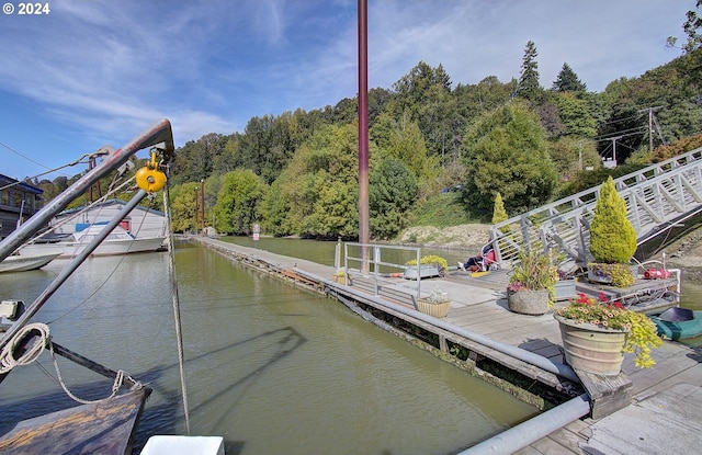 view of dock featuring a water view