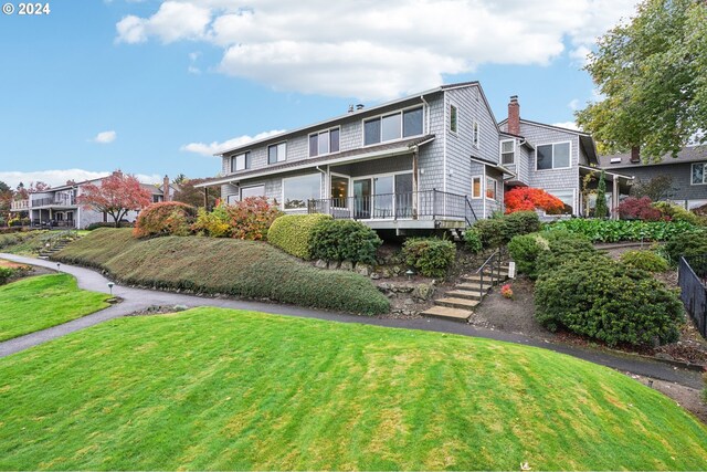 view of front of home with a front lawn