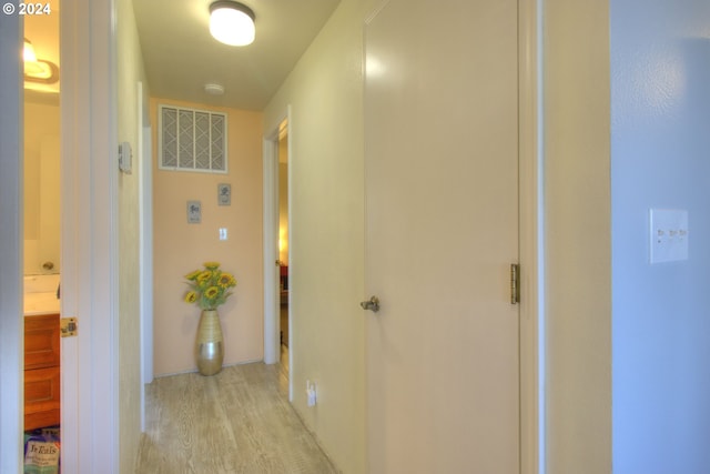 hallway featuring light hardwood / wood-style floors