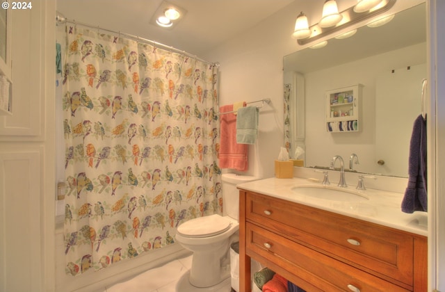 29134 Ellensburg Ave Unit 2, Gold Beach, OR 97444 - bathroom featuring vanity, toilet, a shower with shower curtain, and tile patterned floors
