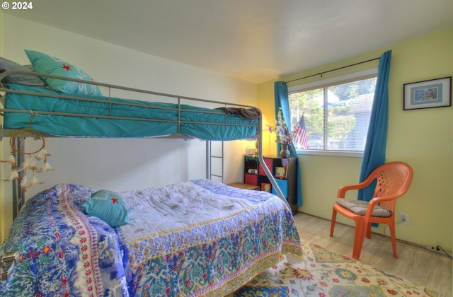 bedroom featuring light wood-type flooring