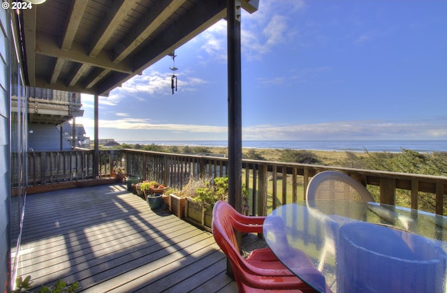 wooden deck with a water view