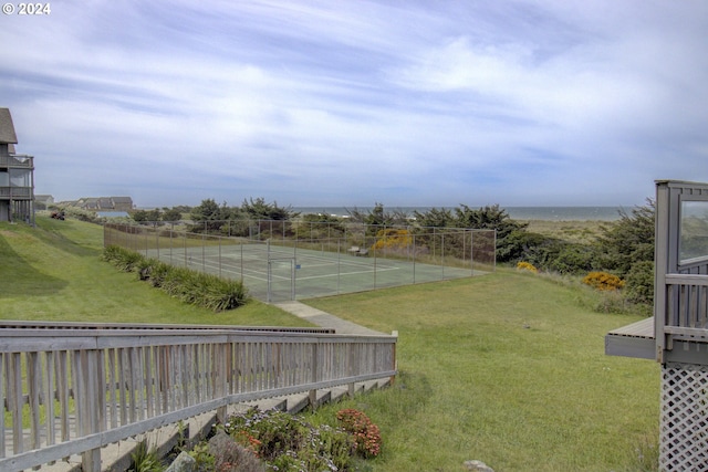 view of yard with tennis court