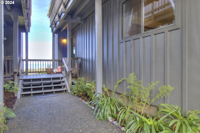 29134 Ellensburg Ave Unit 2, Gold Beach, OR 97444 - view of exterior entry featuring board and batten siding and a deck