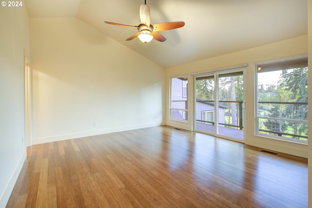 unfurnished room featuring ceiling fan, high vaulted ceiling, and light hardwood / wood-style floors