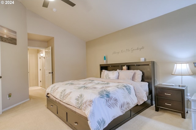 bedroom featuring ceiling fan, light carpet, and lofted ceiling