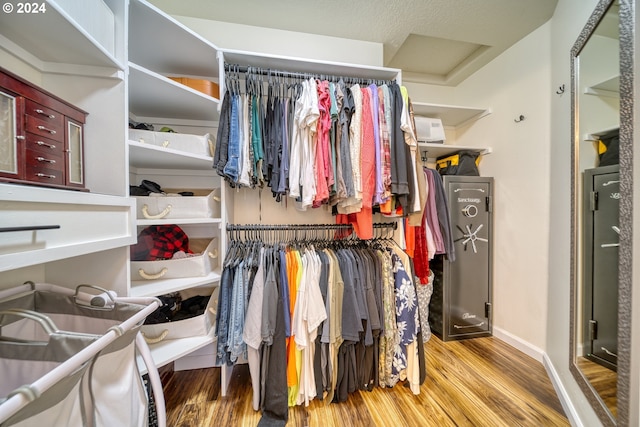 walk in closet featuring hardwood / wood-style floors