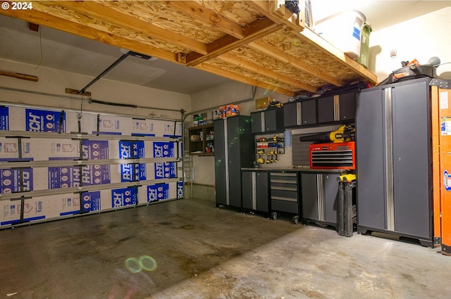 garage featuring stainless steel fridge