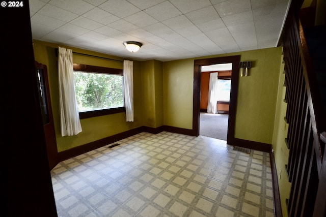 spare room with plenty of natural light