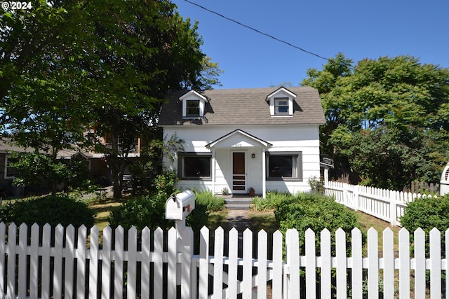 view of new england style home