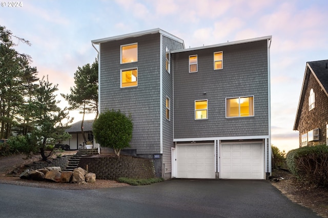 view of front of property featuring a garage