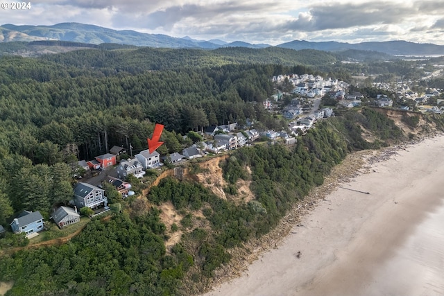 drone / aerial view featuring a mountain view