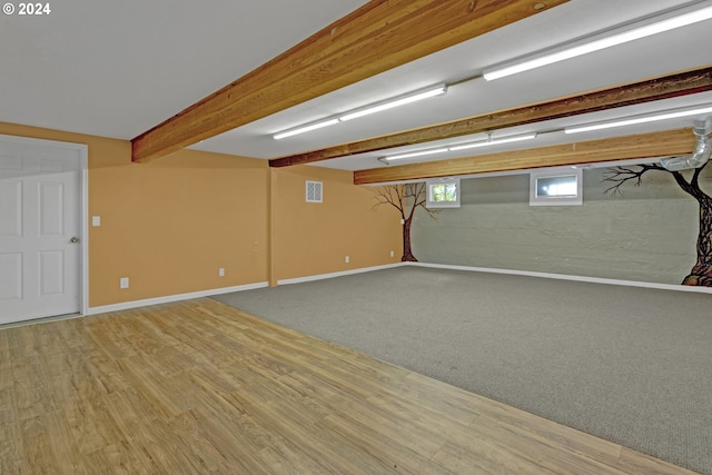 basement with wood-type flooring