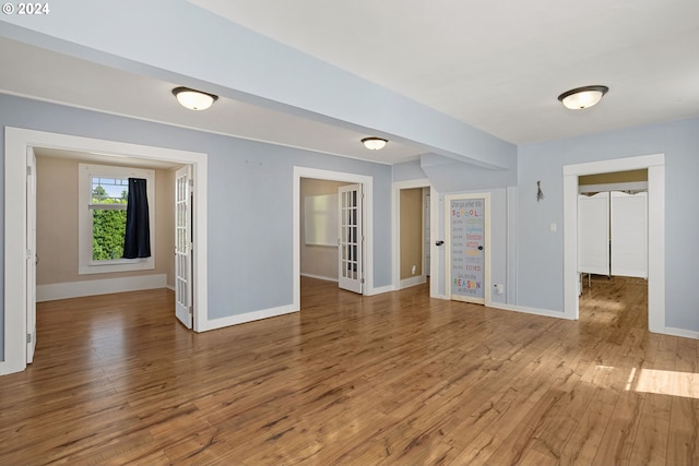 empty room featuring hardwood / wood-style floors