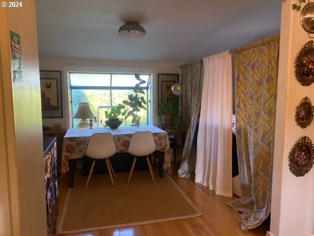 dining space with light hardwood / wood-style flooring