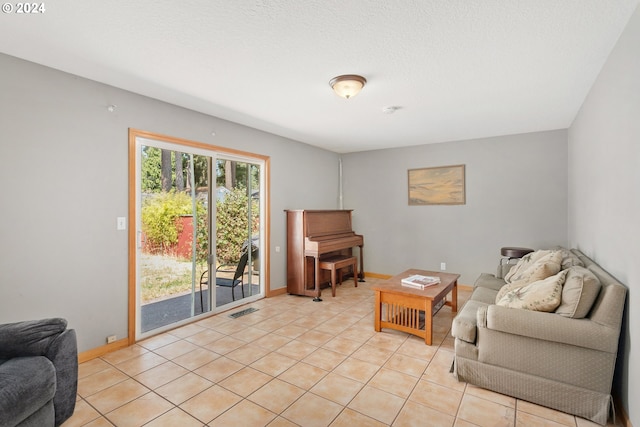 living room featuring light tile patterned floors