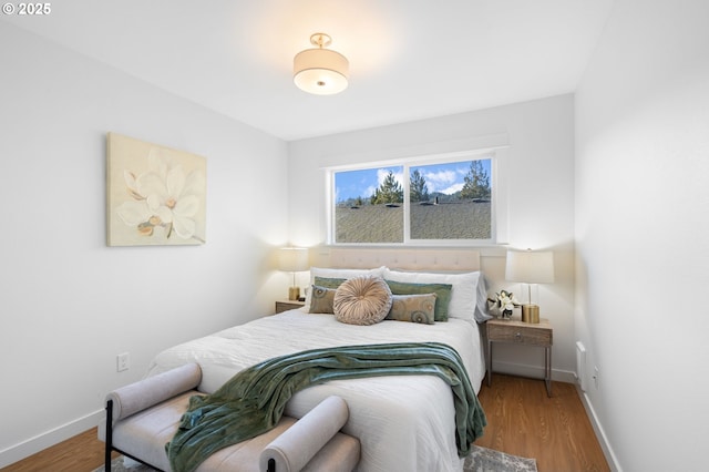 bedroom featuring wood-type flooring