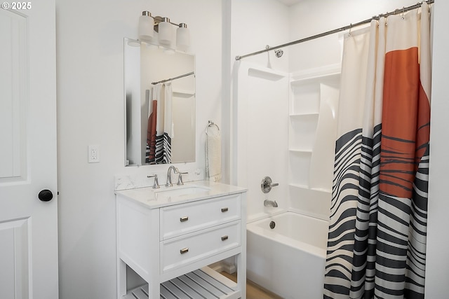 bathroom with vanity and shower / tub combo with curtain