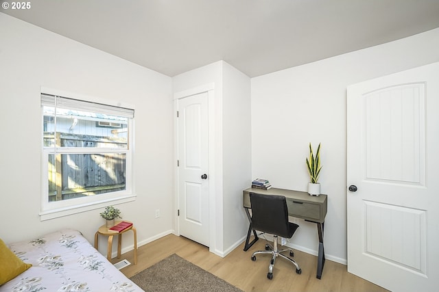 bedroom featuring light hardwood / wood-style floors